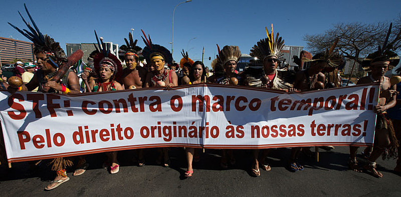 Indígenas e militantes protestam contra o Marco Temporal a ser julgado pelo STF